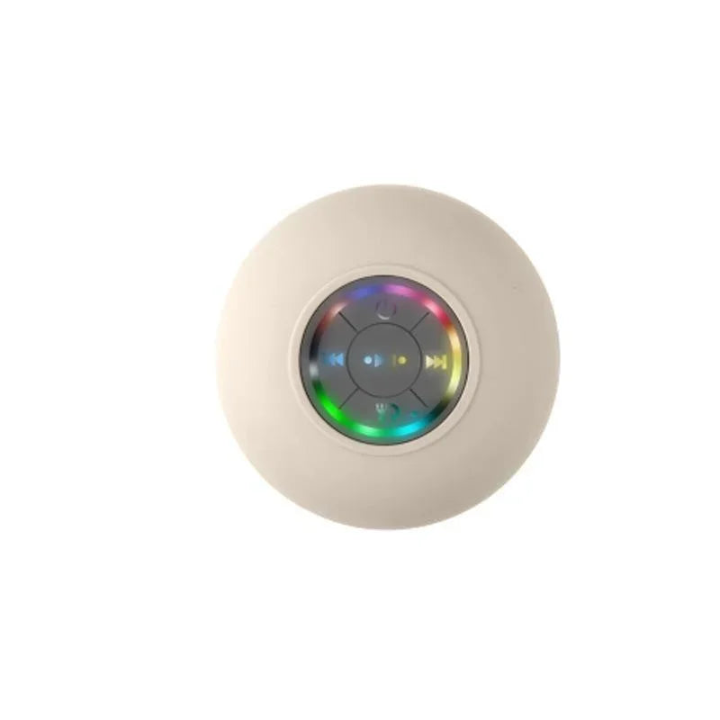 Cream-colored spherical bluetooth speaker with suction cup and luminous rainbow led control panel for portable use
