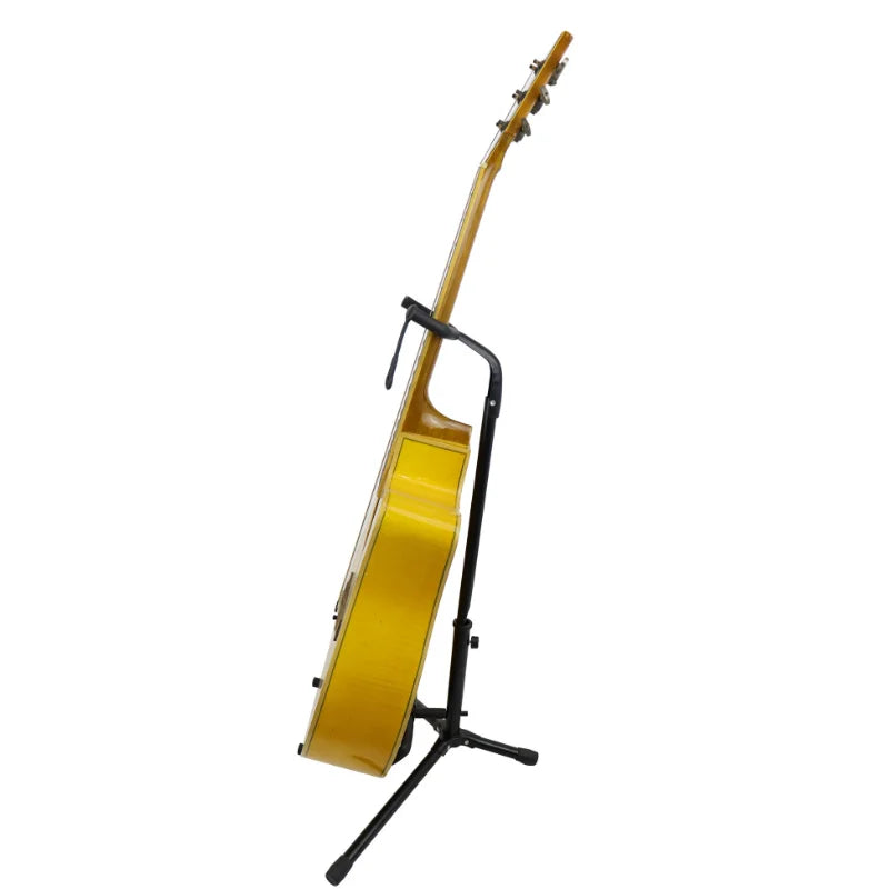 A bright yellow acoustic guitar resting on a portable universal guitar collapsible single stand with safety lock