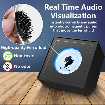 Black portable visual music device with blue-lit ferrofluid magnetic display forming dynamic shapes by venom sensor ferrofluid