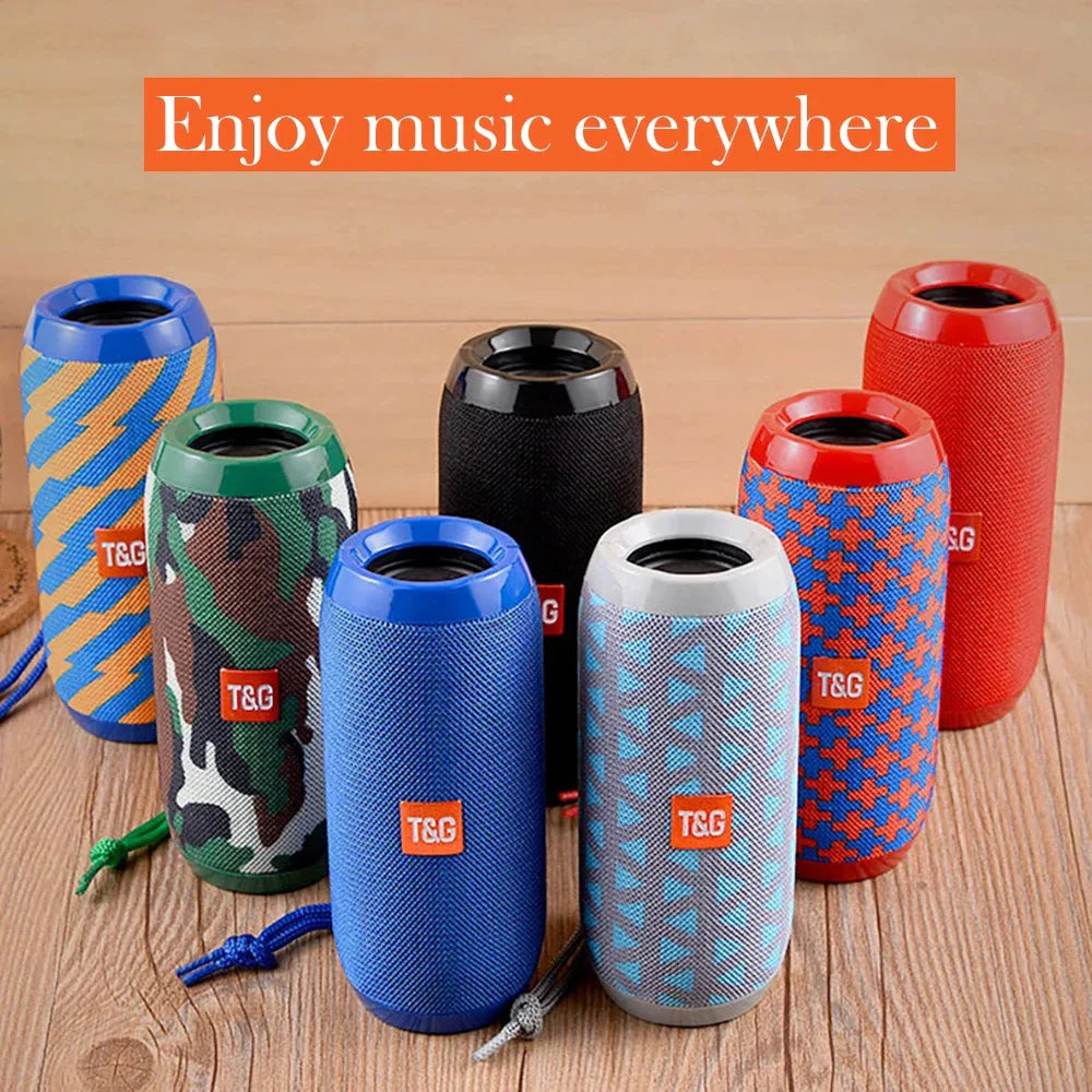 Colorful portable wireless bluetooth speakers with textured fabric and braided cords for radio fm handfree use