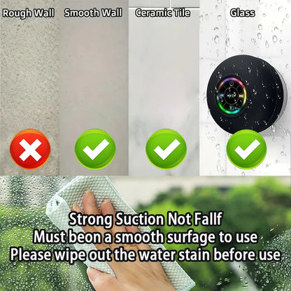 Black circular suction cup mount with colorful illuminated center for ipx4 waterproof portable wireless bluetooth speaker