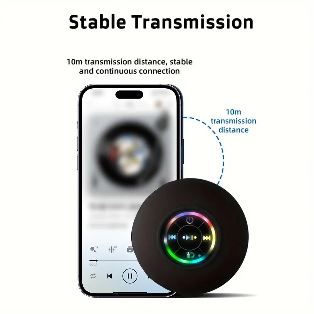 Black circular portable wireless bluetooth speaker with colorful illuminated buttons ipx4 waterproof and suction cup design