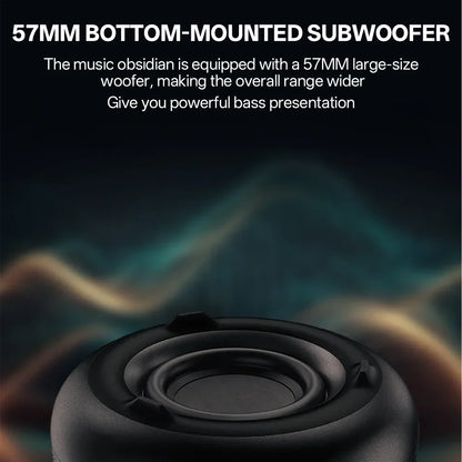 Black portable wireless theater speaker subwoofer with 57mm bottom-mounted driver and acoustic breathing lamp