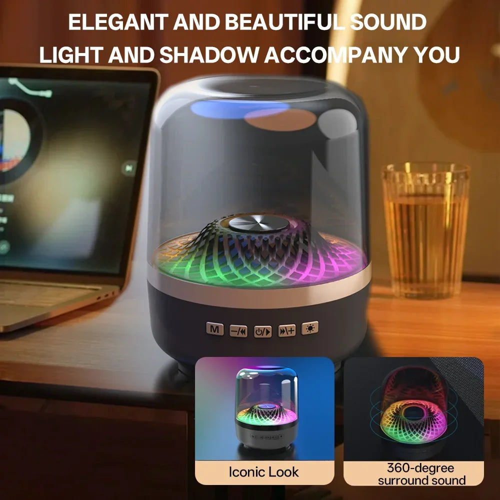 A sleek transparent dome-shaped theater speaker subwoofer with a black base and colorful acoustic breathing lamp lighting