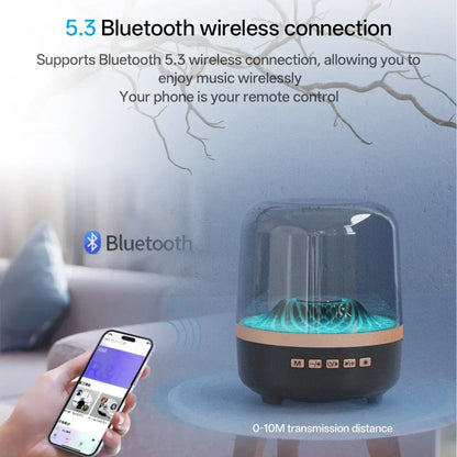 Portable wireless soundbar theater speaker subwoofer with transparent glass dome and teal acoustic breathing lamp light