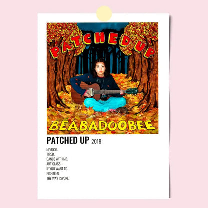 A modern graphic poster of a woman with guitar in blue pants among autumn leaves for beabadoobee music decor
