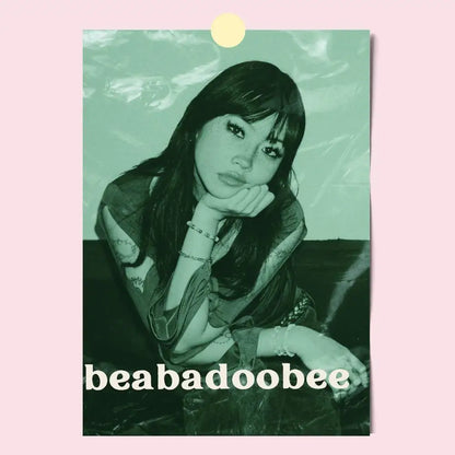 Vintage-style green-toned poster of beabadoobee with layered clothing and bracelets featuring modern graphic design