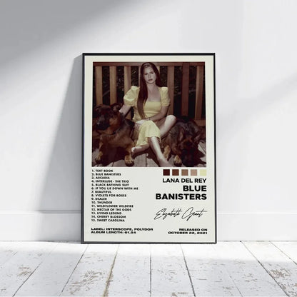 A framed poster print of lana del rey in a yellow dress with dogs featuring the blue banisters album tracklist for home decor