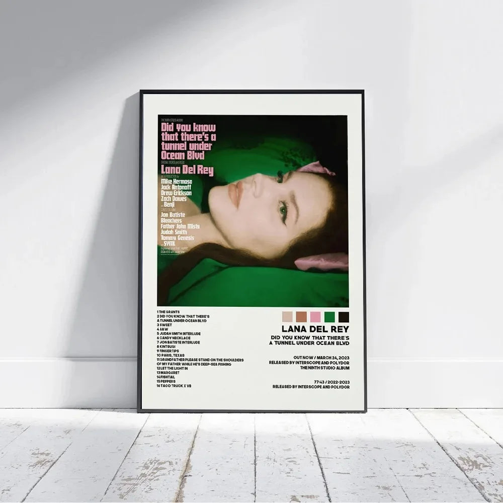 A framed poster featuring lana del rey with green and pink text of her did you know that theres a tunnel under ocean blvd album artwork for home decor