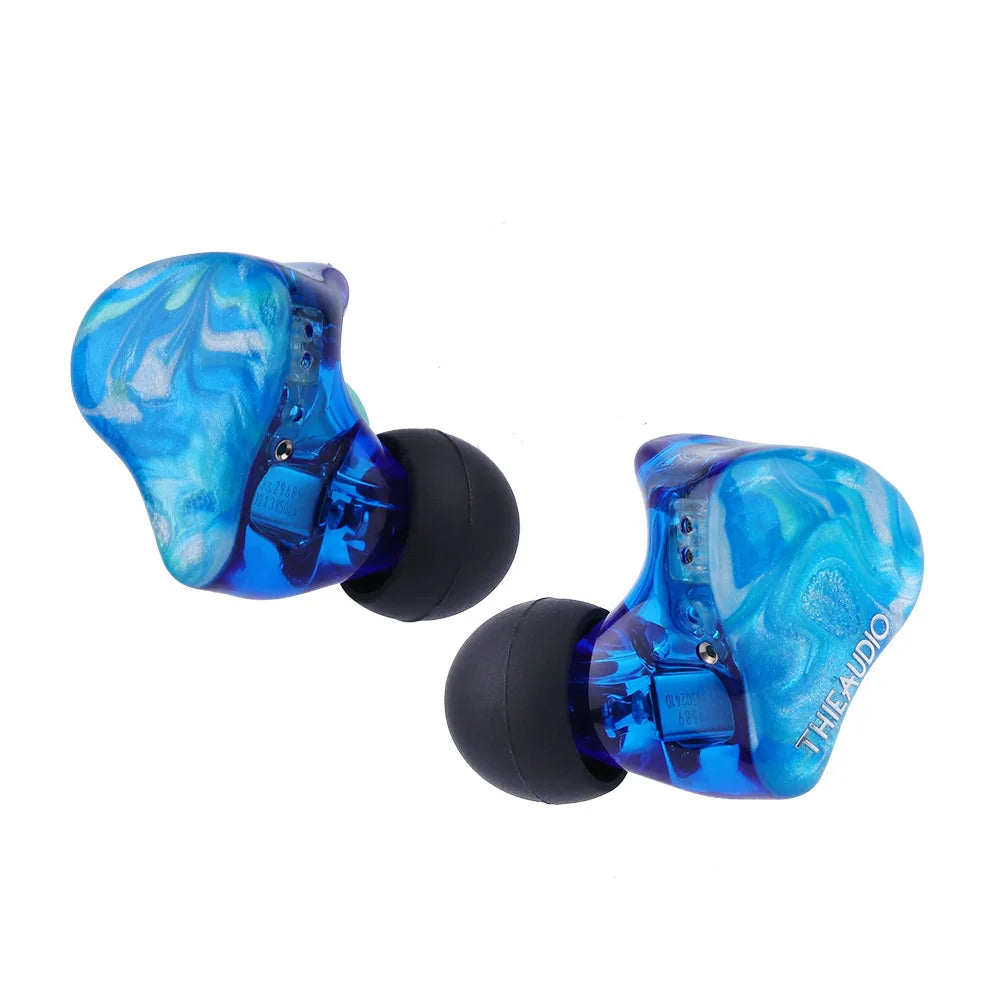 Transparent blue marbled thieaudio legacy hybrid in-ear monitor with beryllium drivers for audiophiles musicians