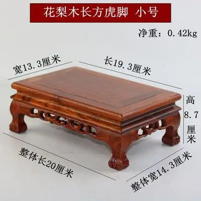 A premium wooden pedestal coffee table in reddish-brown hua li wood with carved tiger foot legs for coffee tea sets figurines vases flower