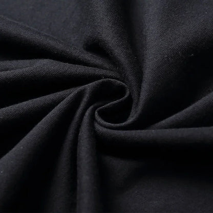 Black soft textured fabric with subtle ribbed weave on a producer artist production beat maker music t shirt