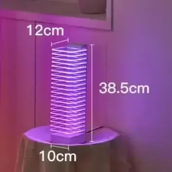 A tall slender purple tower voice control led lamp with cylindrical base and vertical light strips for desk use