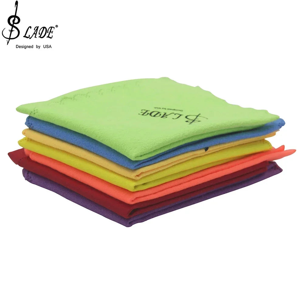 A stack of vibrant microfiber cleaning cloths in assorted rainbow hues for keys bb clarinet accessories reed box cleaning brushes trimmer