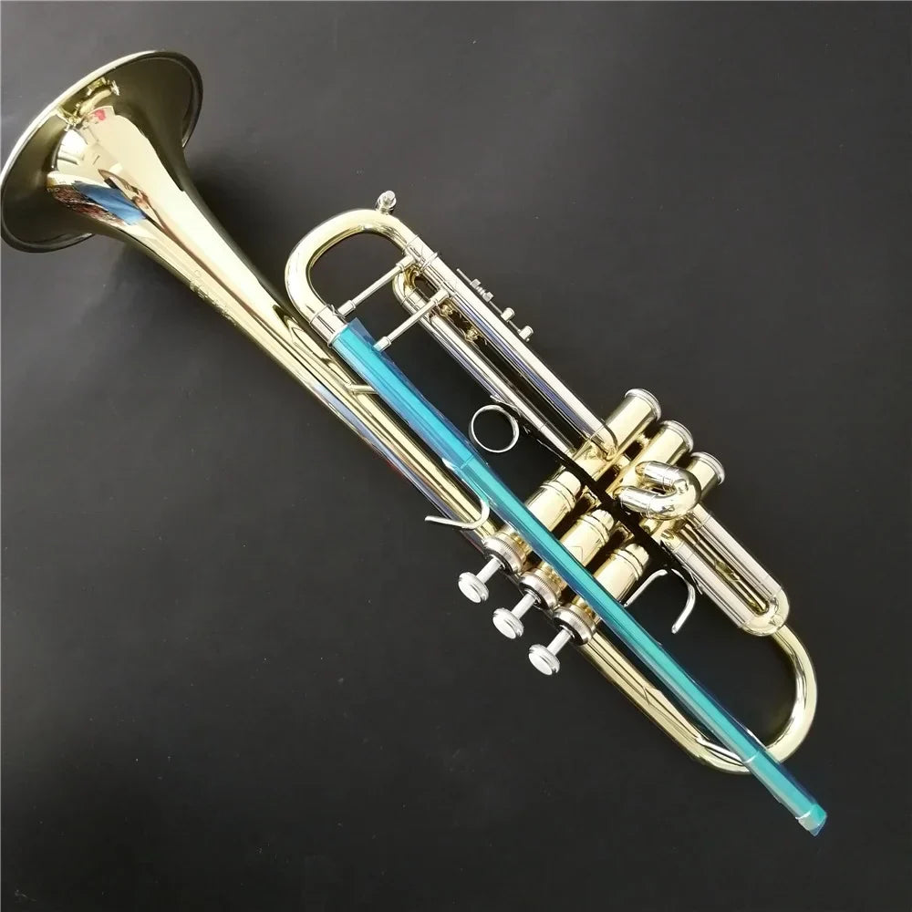 Professional bb trumpet with shiny gold brass body and blue plastic slide designed for student use and beat music store