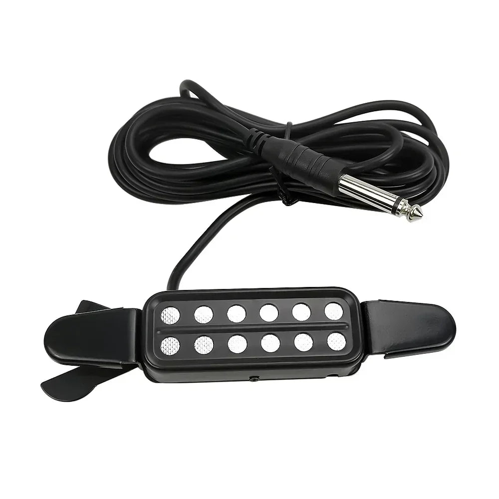 Black clip-on acoustic guitar pickup transducer with six silver magnetic poles and coiled cable for pickup transducer amplifier