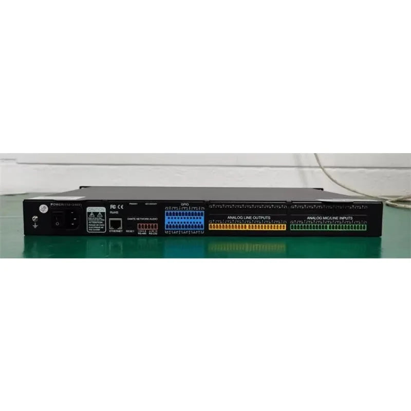Black professional digital audio processor board with color-coded xlr rca connectors for conference speaker management