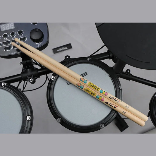 A pair of light-colored professional drum stick 5a walnut wood with colorful easter-themed graphics by kiny