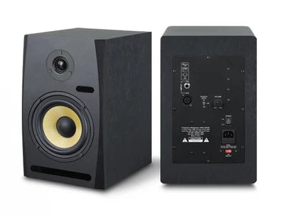 Black professional home studio monitor speaker with yellow woofer cone and silver tweeter for microphone device recording