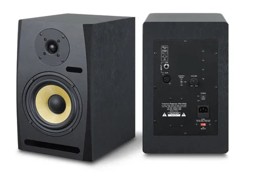 Black professional home studio monitor speaker with yellow cone and black grille for microphone device recording quality