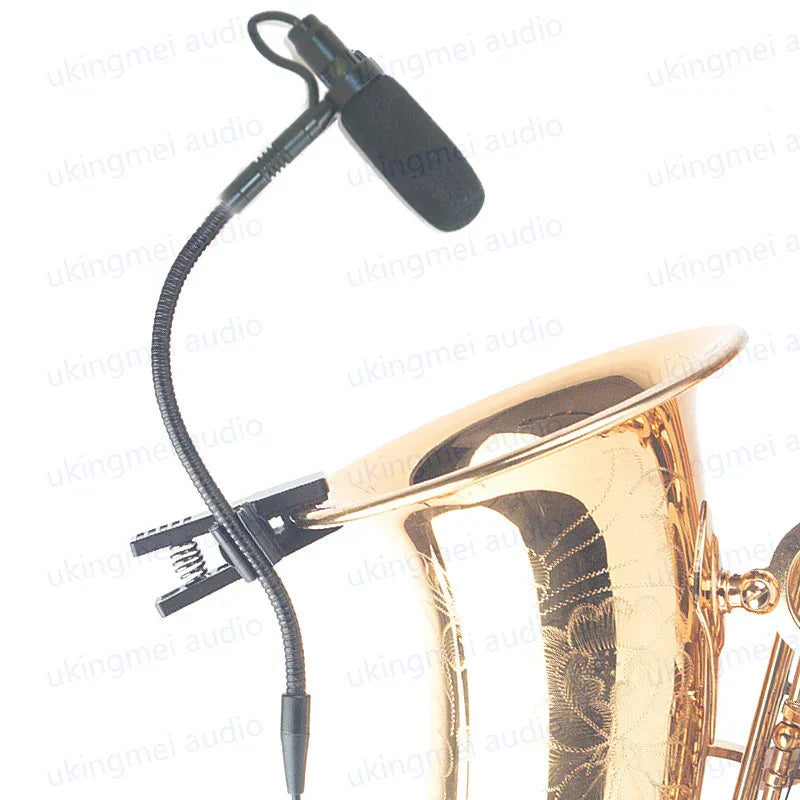 Black flexible instrument condenser gooseneck microphone with foam windscreen clipped to brass saxophone bell