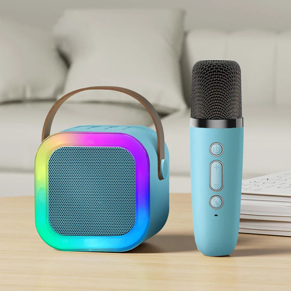 Light blue portable peaker columnspeaker with rainbow led lights and brown leather handle paired with ktv karaoke microphone bluetooth audio
