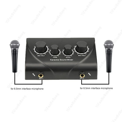 Black professional sound mixer with four knobs and dual 6.5mm mic inputs flanked by silver mesh microphones for small exquisite karaoke