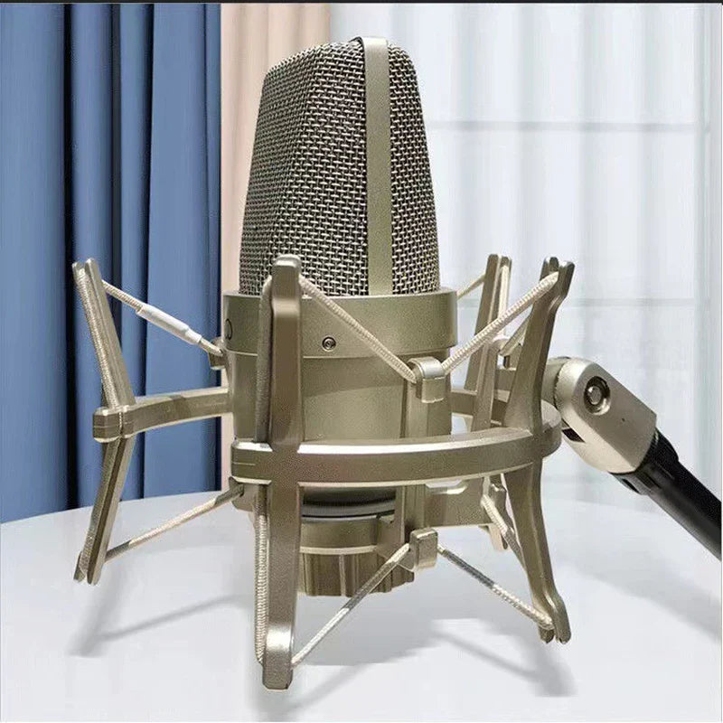 A sleek metallic professional studio condenser microphone with fine mesh grille for laptop mic singing karaoke streaming wired use