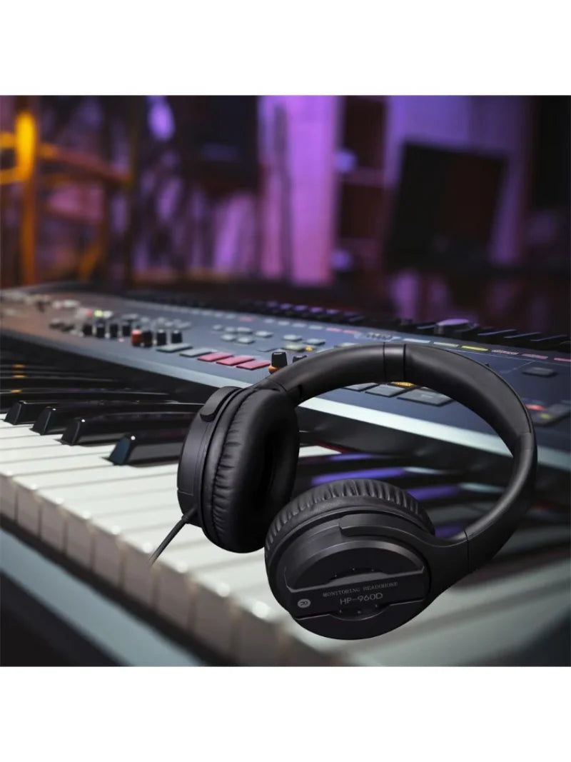 Black over-ear hifi monitor headphones with matte finish and padded earcups for computer music and gamer headset use