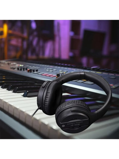 Black over-ear hifi monitor headphones with matte finish and padded earcups for computer music and gamer headset use