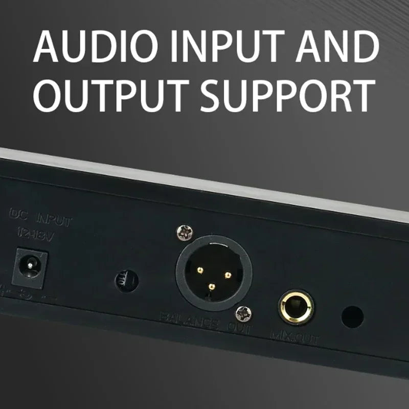 Back of black professional vhf wireless microphone system showing 3.5mm jack xlr and gold rca outputs for home party church