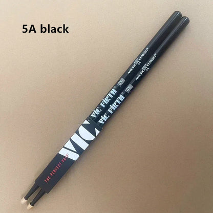 Black vic firth drumsticks 5a with white and red branding made of hickory for professional jazz rock durable use