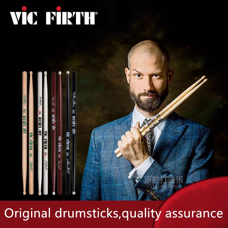A set of professional vic firth drumsticks in natural wood, white, red, and black for jazz rock durable use