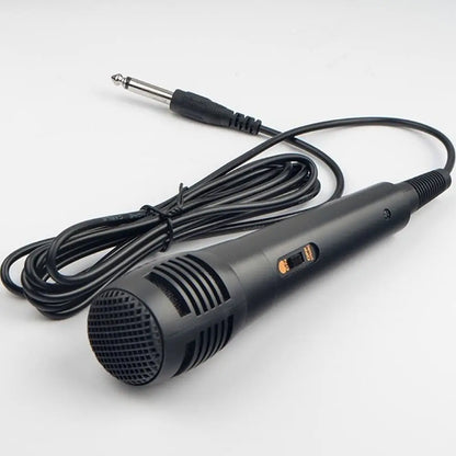 Black professional wired dynamic microphone with coiled cable, orange switch, and 6.35mm plug for karaoke recording
