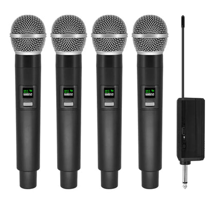 Set of four black professional wireless microphone channels karaoke handheld with silver mesh and green displays and receiver unit