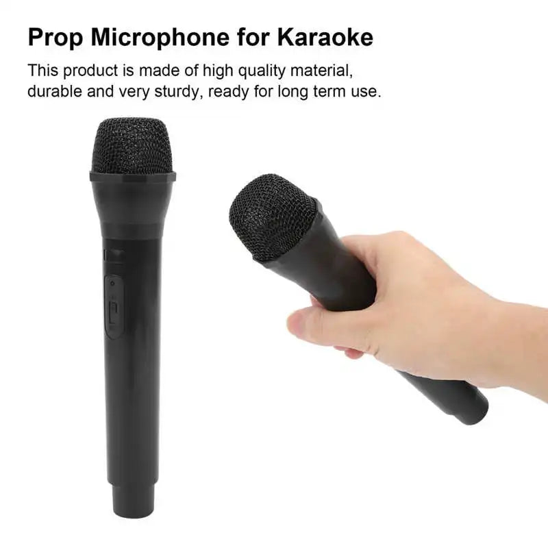 Black plastic prop microphone with mesh grille and textured grip for karaoke dance shows and karaoke studio microphone use