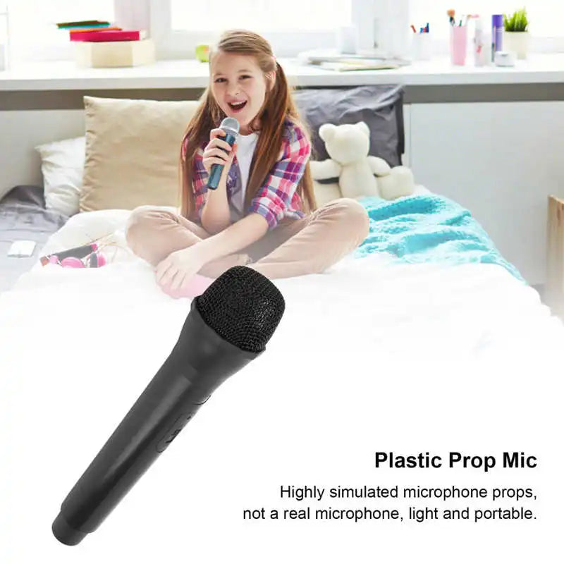Black plastic prop microphone with textured grille and ergonomic grip for karaoke dance shows and practice microphone prop