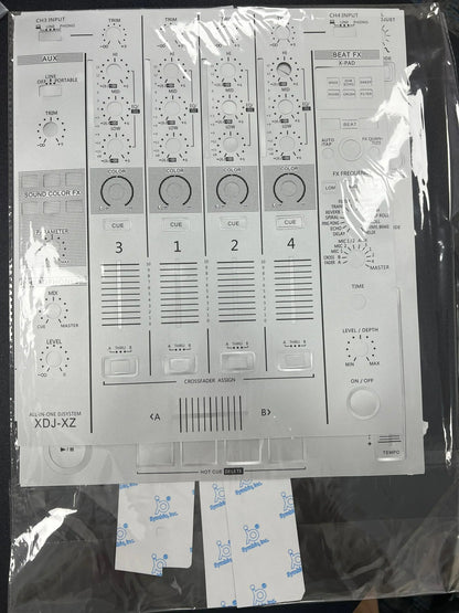 White plastic control panel of all-in-one dj controller with protective sticker pioneer film for full surfing protection