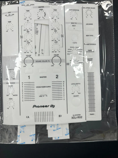 White pioneer xdj-rx2 all-in-one dj controller with labeled knobs featuring protective sticker pioneer pvc film surfing protection