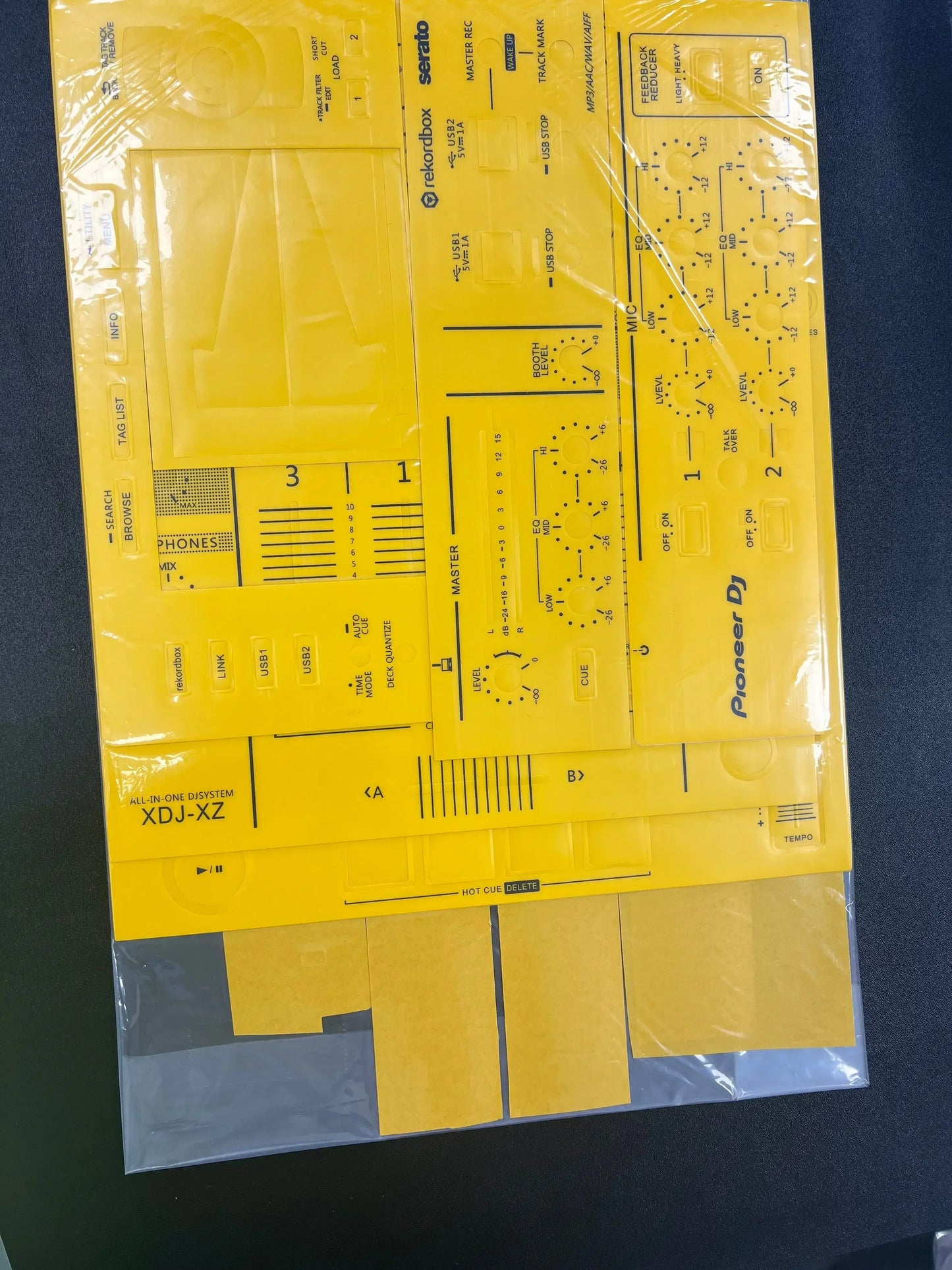 Yellow pioneer dj xdj-xz controller faceplate kit in clear plastic packaging for protective sticker pioneer and surfing protection