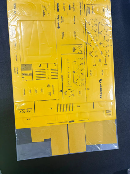 Yellow pioneer dj xdj-xz controller faceplate kit in clear plastic packaging for protective sticker pioneer and surfing protection