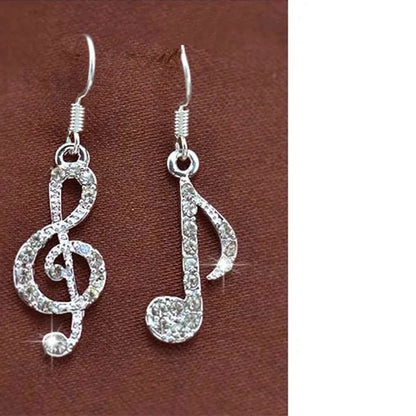 Silver asymmetrical lady earrings featuring punk fashion geometric musical notes adorned with sparkling rhinestones
