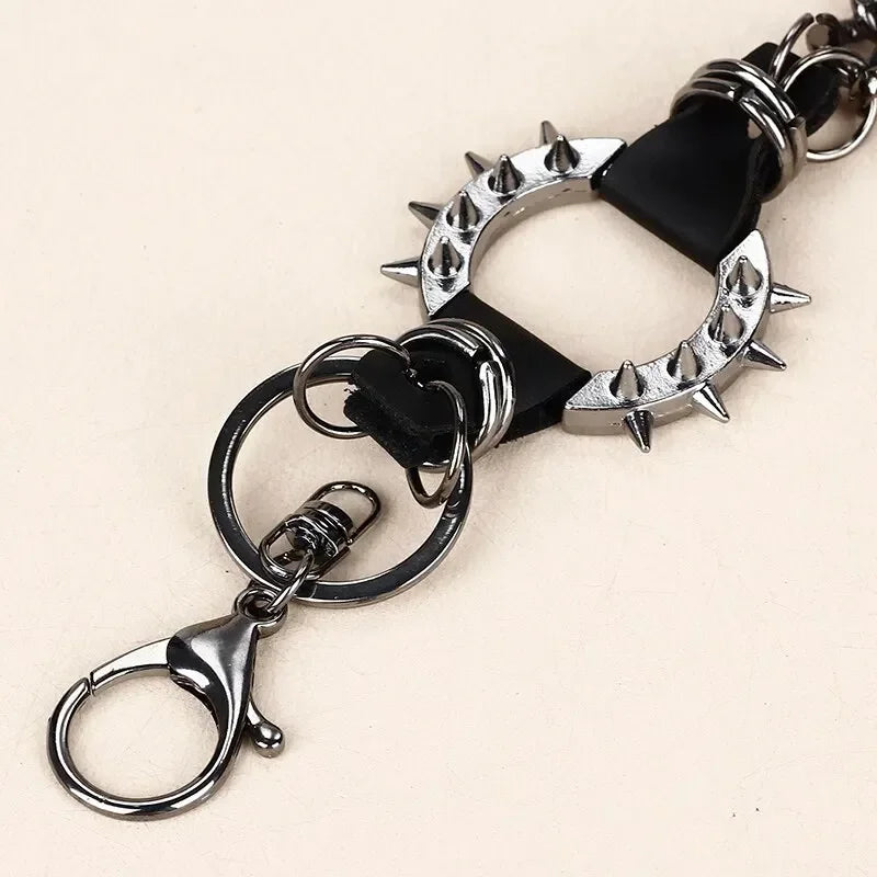 Black leather punk waist chain with silver-toned spiked metal rings and lobster clasp chain pendant retro style