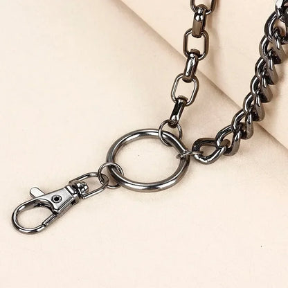 A sleek dark metallic punk waist chain with sturdy lobster clasp and circular ring for spiked pant trouser decoration