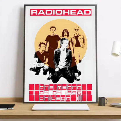 A framed radiohead band canvas poster with bold red and black illustration on white paper featuring lighting effects