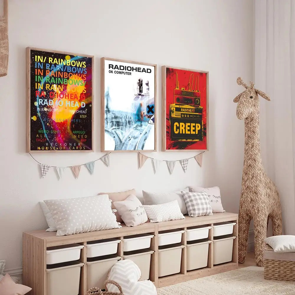 Three framed radiohead band rainbow painting calligraphy hd canvas posters with lighting effects above wooden storage bench