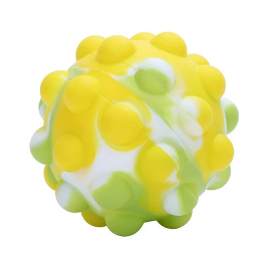 A vibrant yellow and lime green silicone rainbow pop ball with raised bumps for push bubble antistress and stress relief sensory use