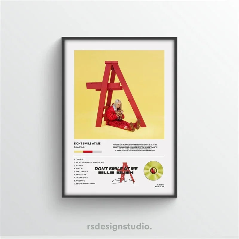 Black-framed rap music album cover poster featuring red wooden a-frame and billie eilish in red for room decor