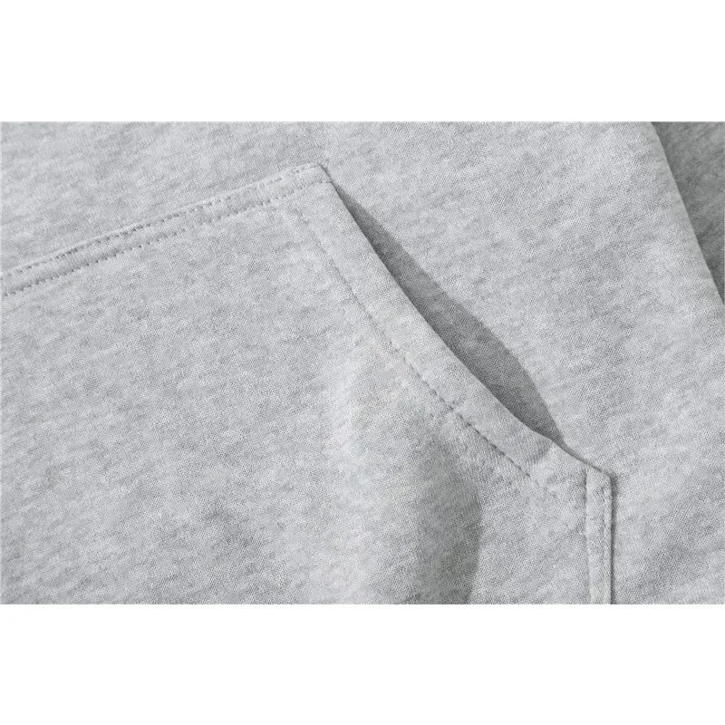 Gray heathered pocket with neatly stitched seams on rapper anuel aa 2023 oversized hip hop hoodie sweatshirt