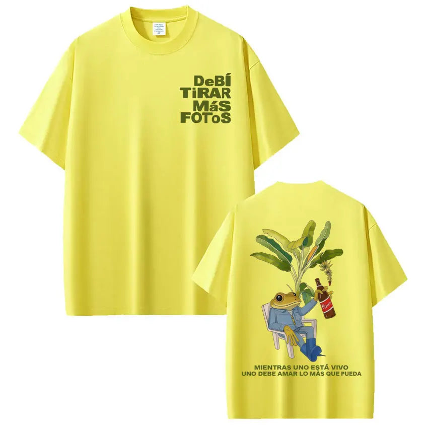 Bright yellow oversized rapper bad bunny t-shirt with playful frog design on back and bold black dtmf world tour text